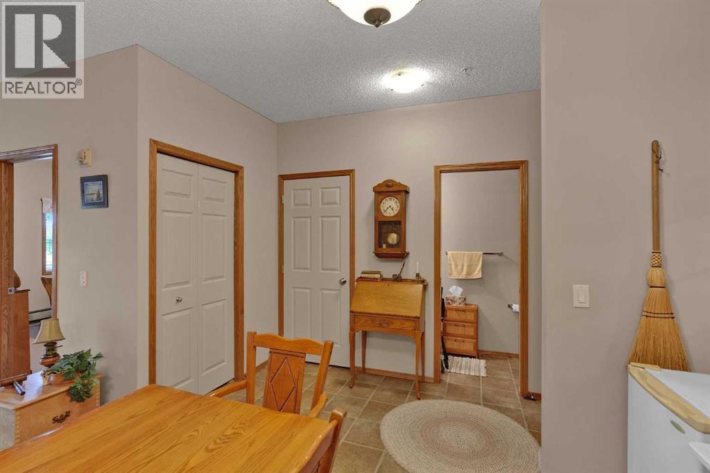 115, 72 Quigley Drive, Cochrane, Alberta  T4C 2K6 - Photo 12 - A2335665