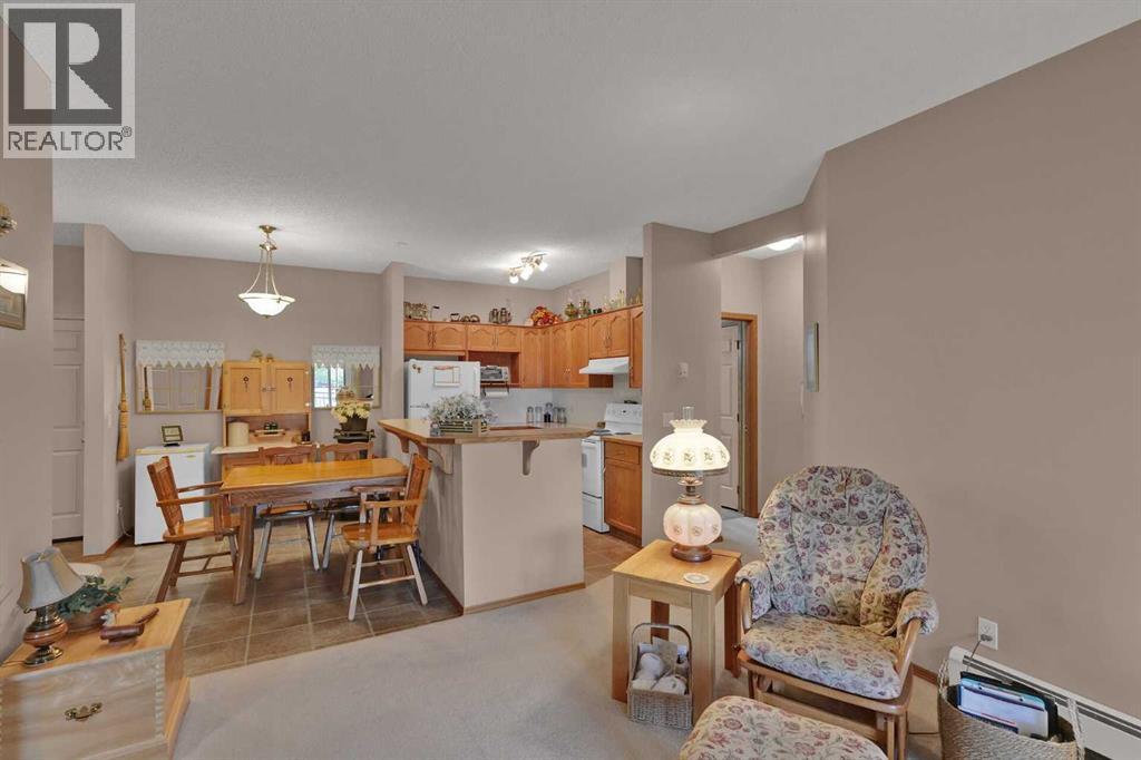 115, 72 Quigley Drive, Cochrane, Alberta  T4C 2K6 - Photo 20 - A2335665