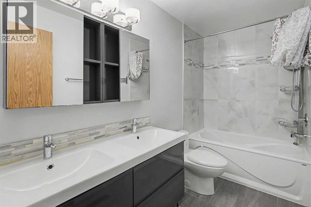 115 Mckenna Crescent SE, Calgary, Alberta  T2Y 1Y2 - Photo 22 - A2336059