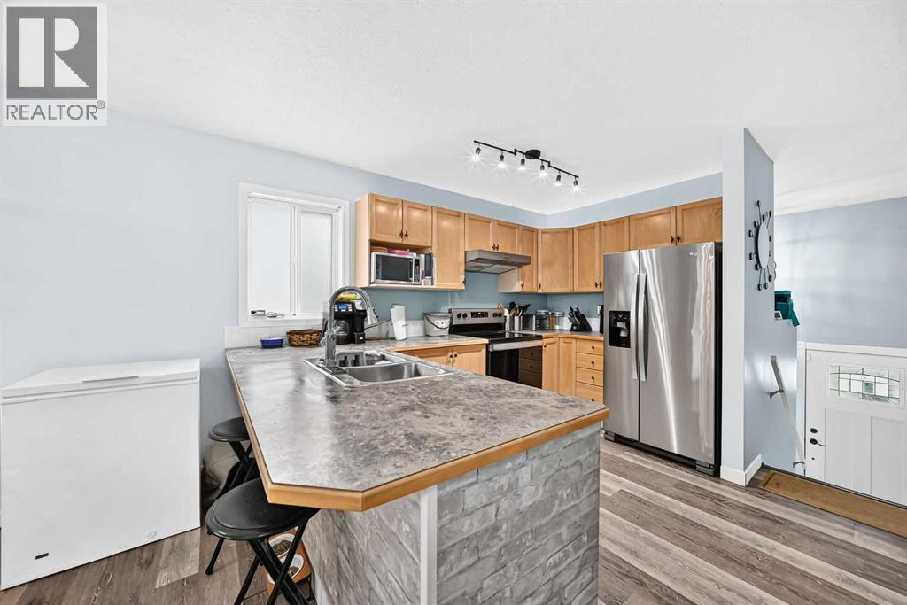 4446 54a Avenue Crescent, Innisfail, Alberta  T4G 1Y3 - Photo 5 - A2335780