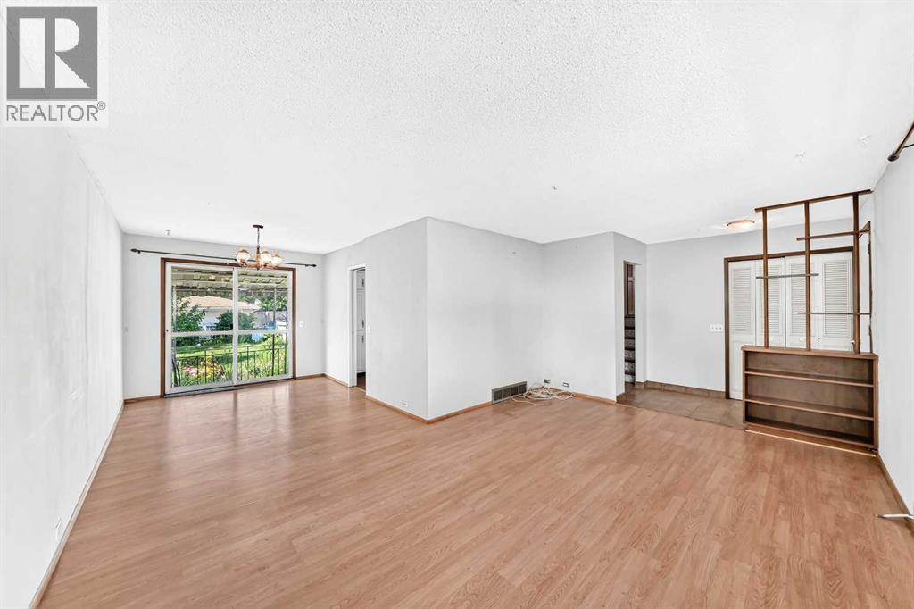 6839 Huntridge Hill NE, Calgary, Alberta  T2K 4A1 - Photo 9 - A2327673