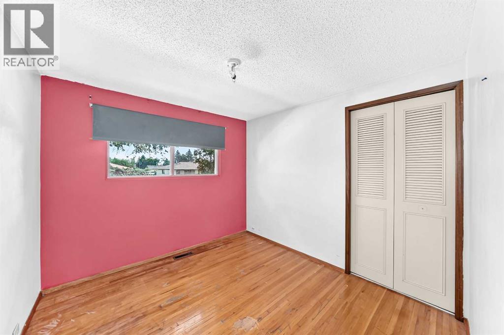 6839 Huntridge Hill NE, Calgary, Alberta  T2K 4A1 - Photo 14 - A2327673