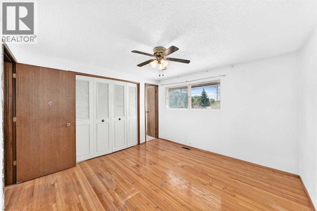 6839 Huntridge Hill NE, Calgary, Alberta  T2K 4A1 - Photo 12 - A2327673
