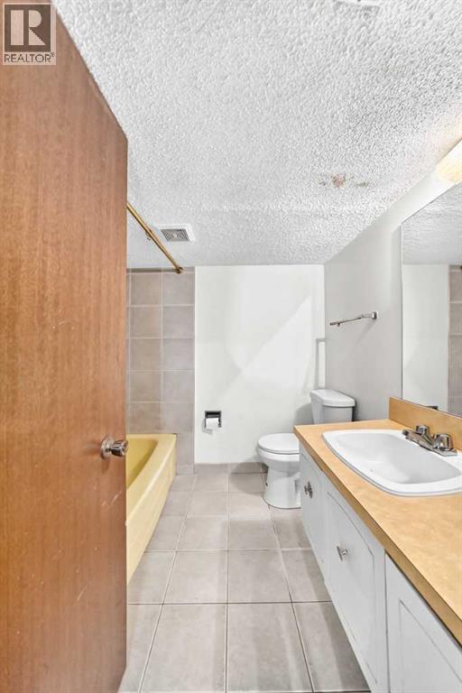 6839 Huntridge Hill NE, Calgary, Alberta  T2K 4A1 - Photo 25 - A2327673