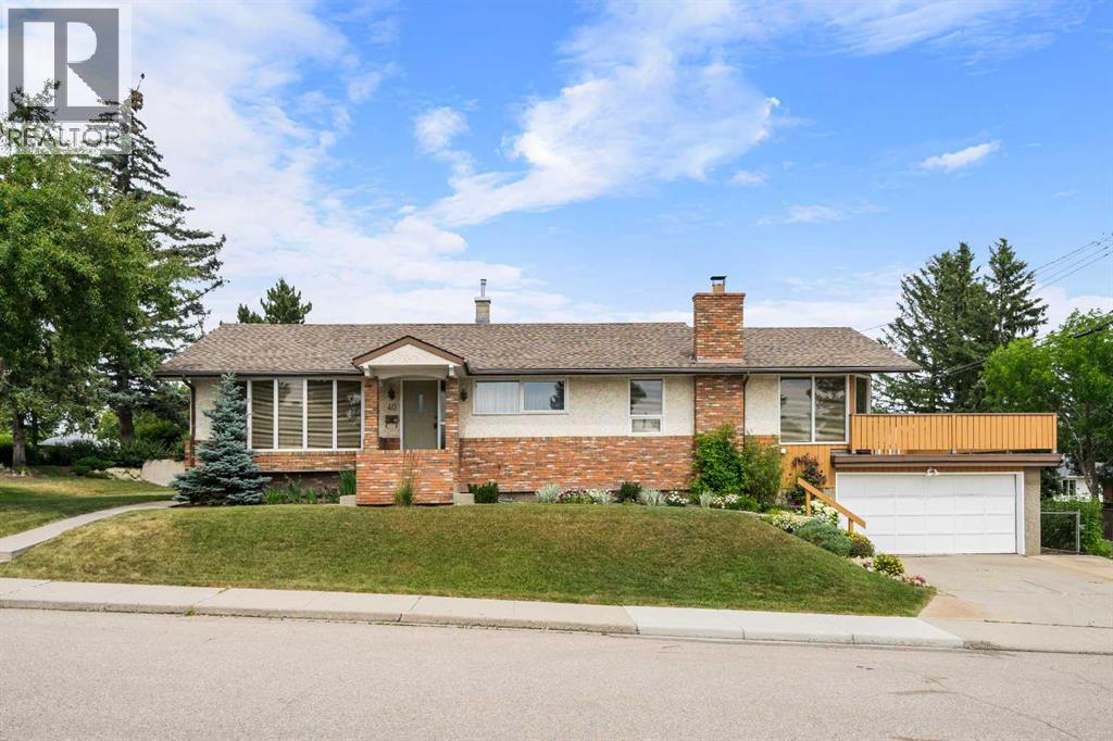 40 Thornlee Crescent NW, Calgary, Alberta  T2K 2W3 - Photo 1 - A2332972