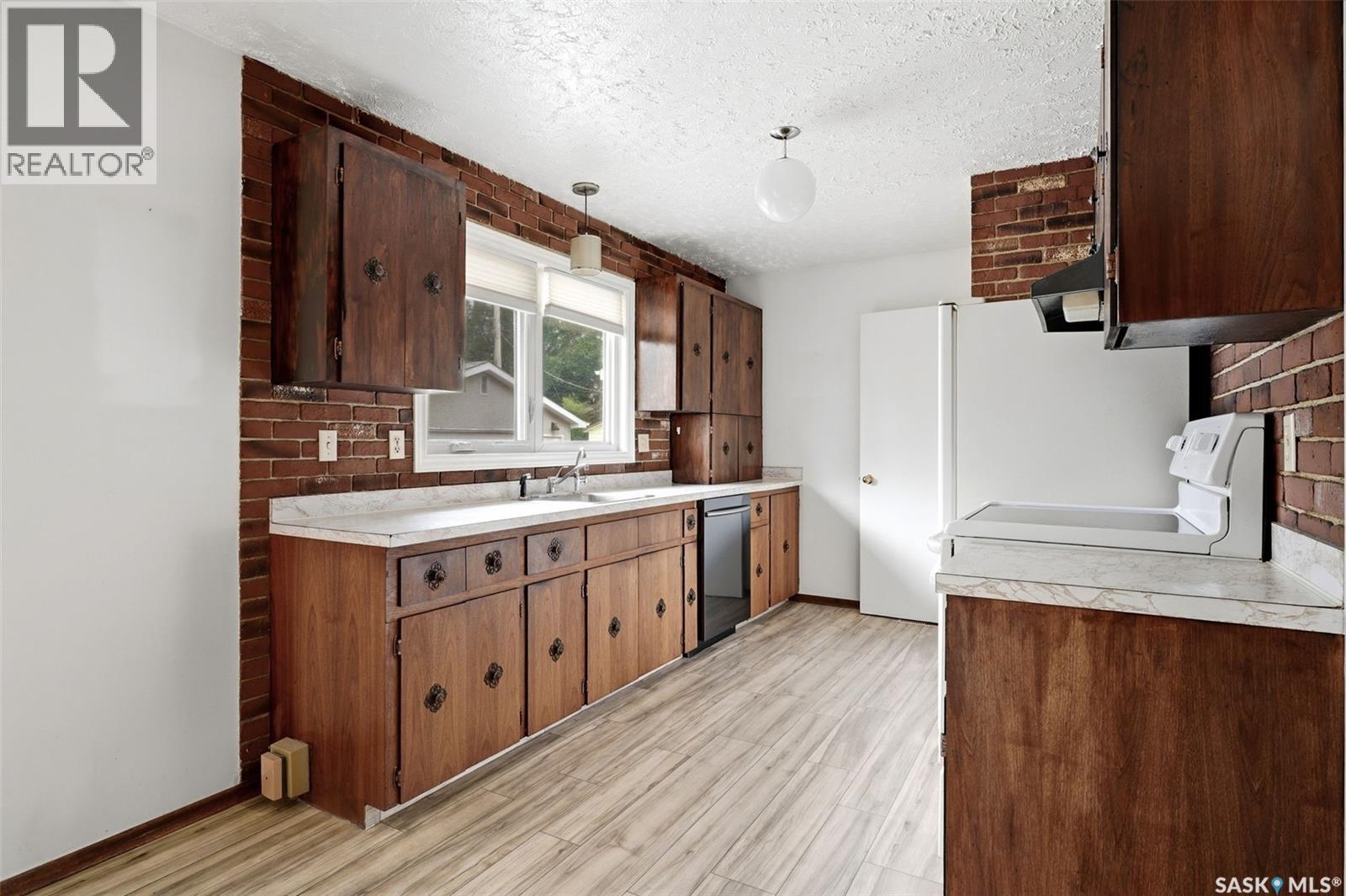 65 Mccaul Crescent, Regina, Saskatchewan  S4R 3X3 - Photo 6 - SK045448