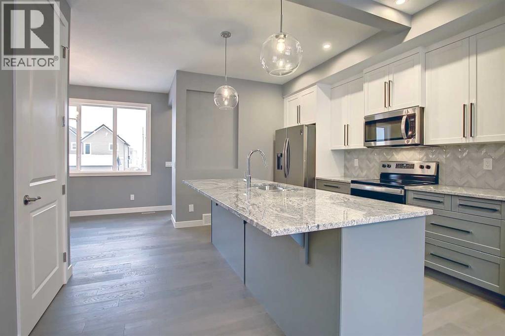 2089 Cobblespring Avenue SW, Airdrie, Alberta  T4B 5Z6 - Photo 7 - A2310730