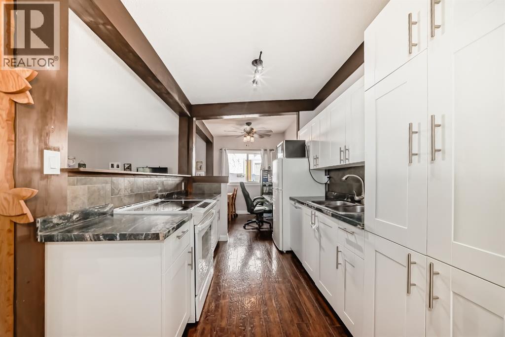 724d Raynard Crescent SE, Calgary, Alberta  T2A 1X7 - Photo 3 - A2307488