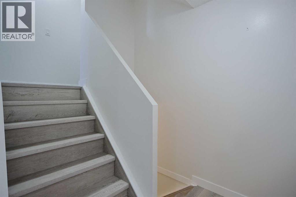 205, 310 Falconridge Crescent Ne, Calgary, Alberta T3J 1H4 - Photo 20 - A2328485