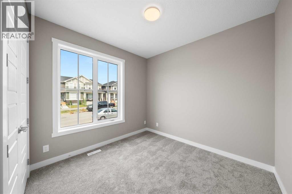 408 Sora Boulevard SE, Calgary, Alberta  T3S 0M2 - Photo 3 - A2336372