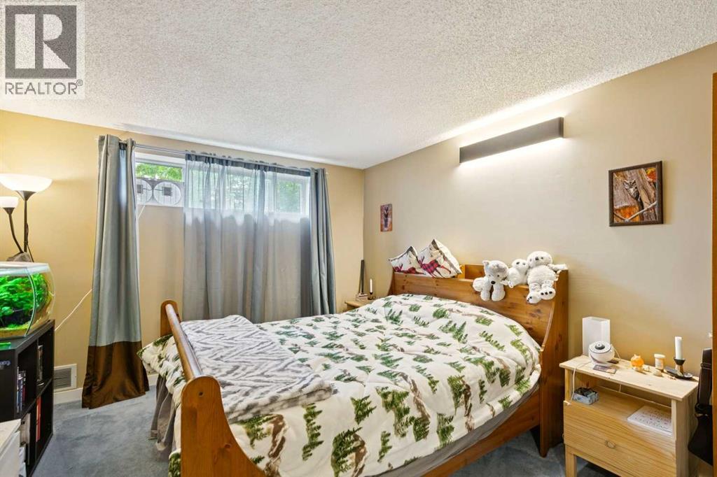 107 Bermuda Drive Nw, Calgary, Alberta  T3K 1H6 - Photo 28 - A2335636