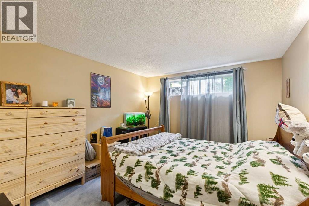 107 Bermuda Drive Nw, Calgary, Alberta  T3K 1H6 - Photo 27 - A2335636