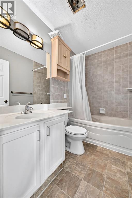 7964 Huntington Road NE, Calgary, Alberta  T2K 5A3 - Photo 21 - A2336139