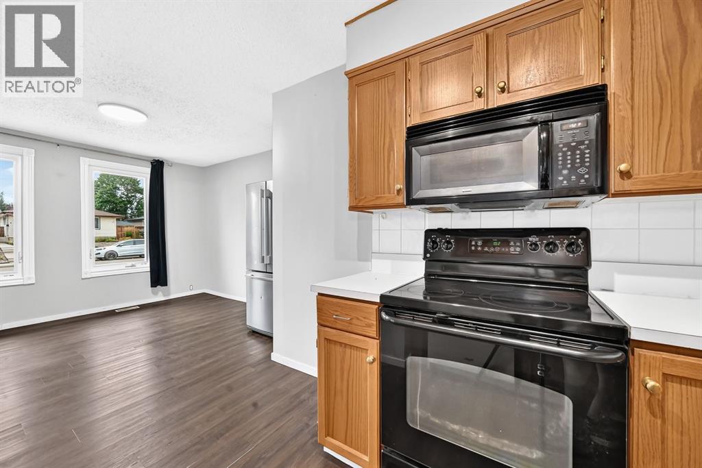 7964 Huntington Road NE, Calgary, Alberta  T2K 5A3 - Photo 6 - A2336139