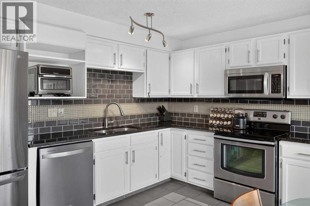 571 Point Mckay Grove NW, Calgary, Alberta T3B 5C4 - Photo 13 - A2332324