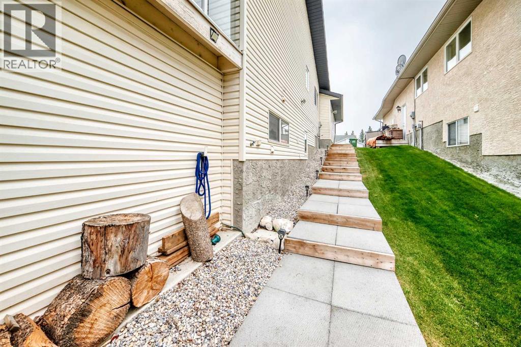61 West Edge Road, Cochrane, Alberta  T4C 1M7 - Photo 39 - A2337172