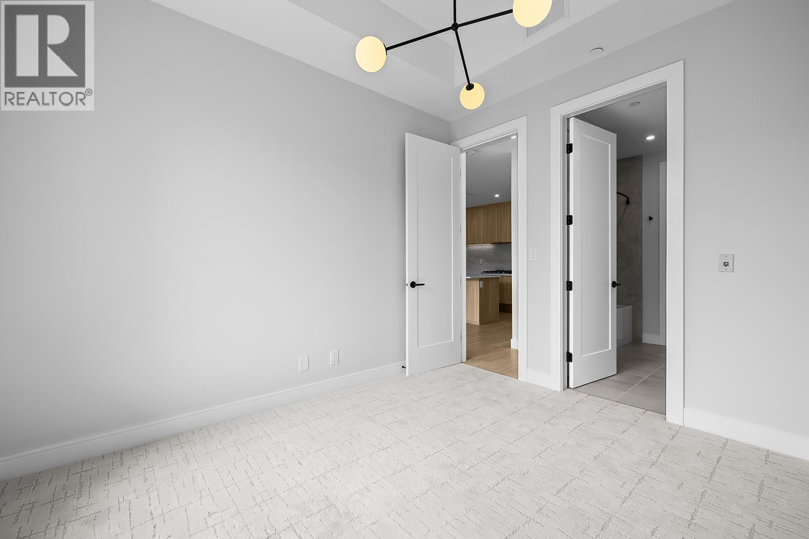 75 Predator Ridge Drive Unit# 208, Vernon, British Columbia  V1H 1G4 - Photo 22 - 10397005
