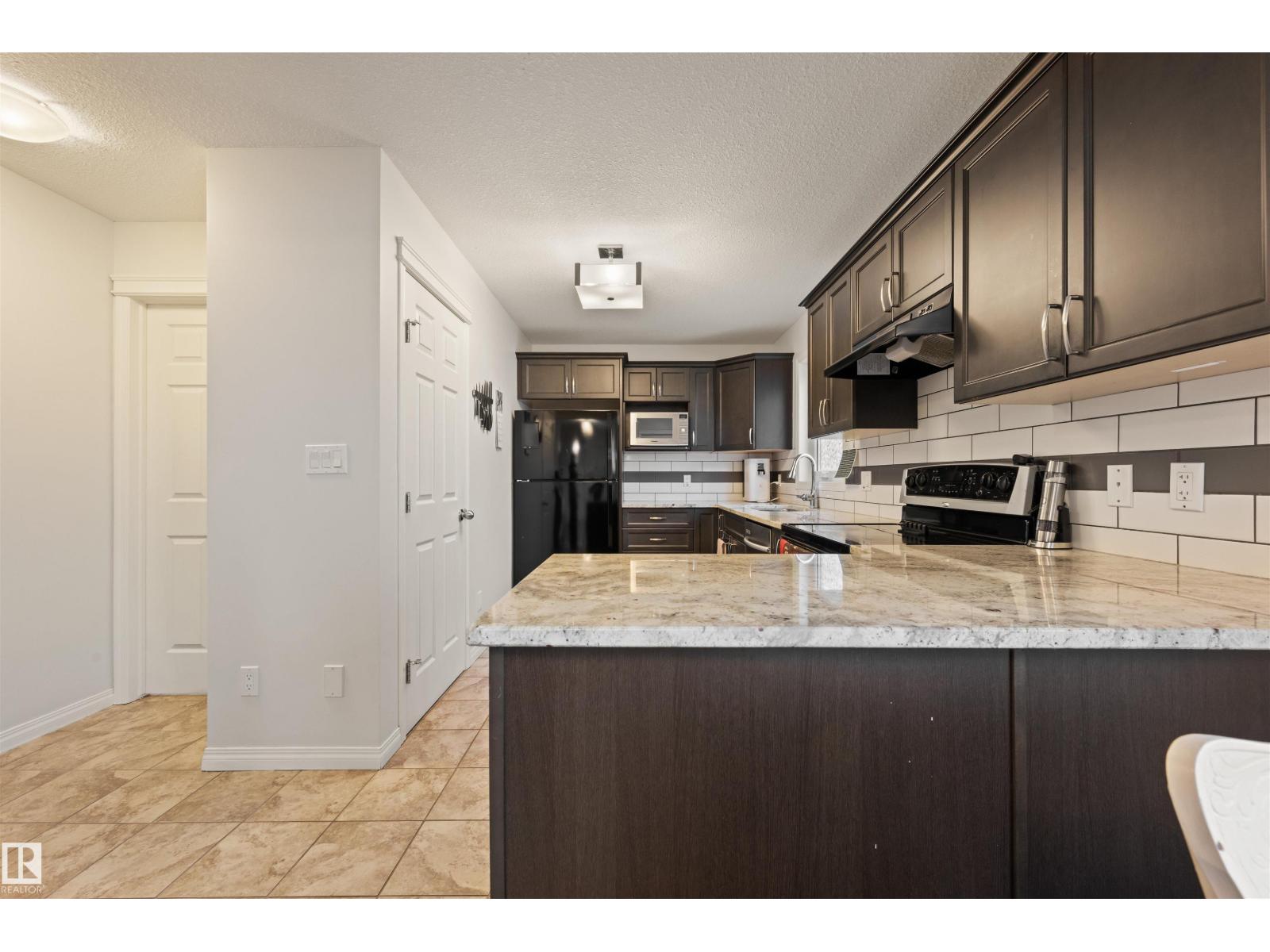 12425 111 Av NW, Edmonton, Alberta  T5M 0M2 - Photo 7 - E4503677