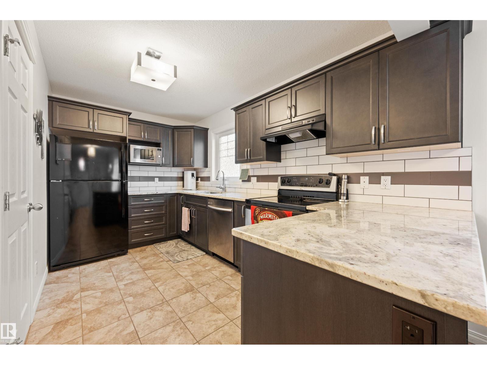 12425 111 Av NW, Edmonton, Alberta  T5M 0M2 - Photo 1 - E4503677