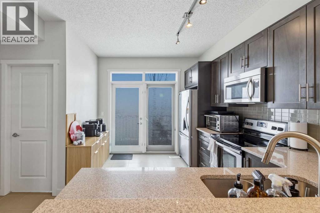 214 Nolanfield Villas Nw, Calgary, Alberta T3R 0T9 - Photo 7 - A2320316
