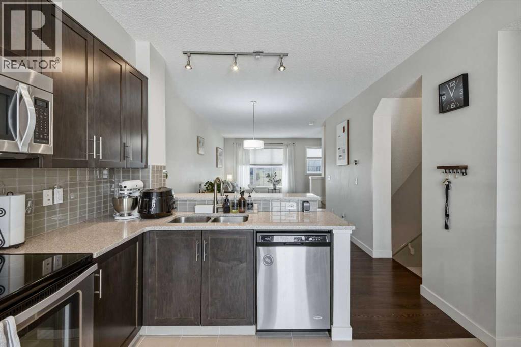 214 Nolanfield Villas Nw, Calgary, Alberta T3R 0T9 - Photo 6 - A2320316