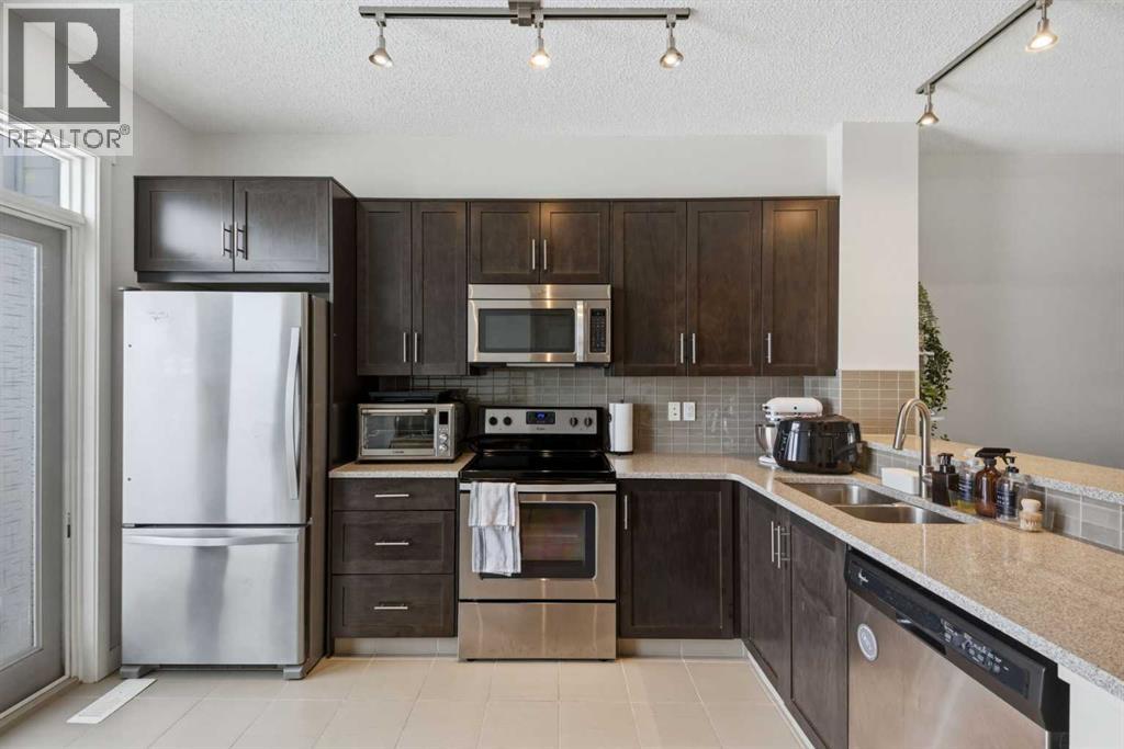 214 Nolanfield Villas Nw, Calgary, Alberta T3R 0T9 - Photo 3 - A2320316