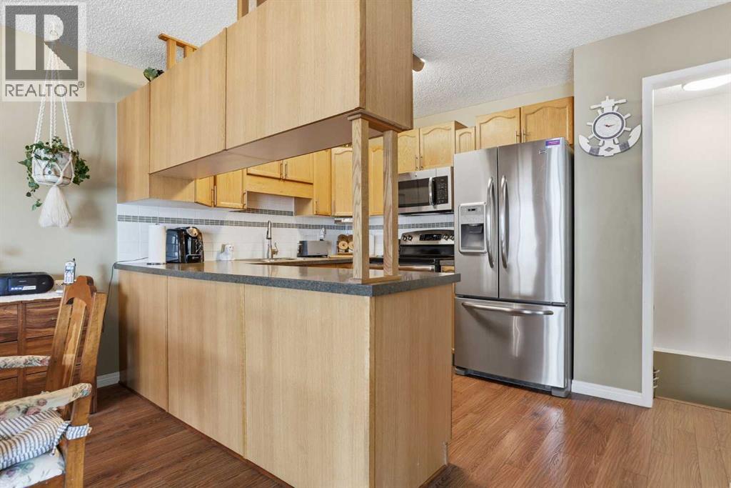 11 Macewan Park Heights NW, Calgary, Alberta  T3K 3W6 - Photo 13 - A2316477