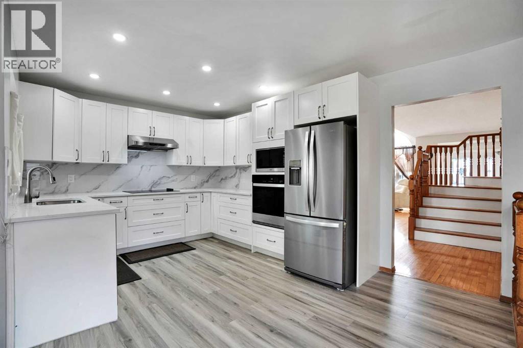 16 Sun Harbour Crescent Se, Calgary, Alberta  T2X 3B1 - Photo 3 - A2334713