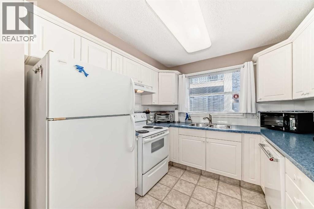 116, 6800 Hunterview Drive Nw, Calgary, Alberta T2K 6K5 - Photo 6 - A2316464