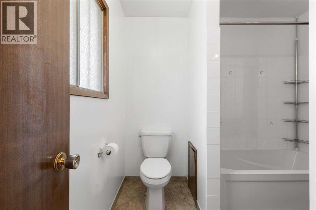 6008 Dalgetty Drive Nw, Calgary, Alberta  T3A 1J3 - Photo 21 - A2335531