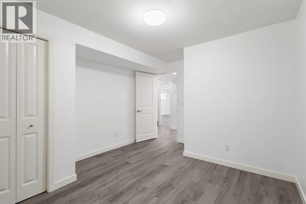 6008 Dalgetty Drive Nw, Calgary, Alberta  T3A 1J3 - Photo 27 - A2335531