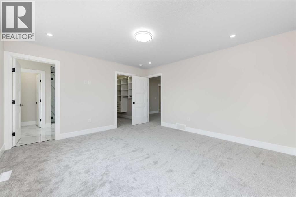 1004 Waterford Drive, Chestermere, Alberta  T1X 2T7 - Photo 24 - A2335891