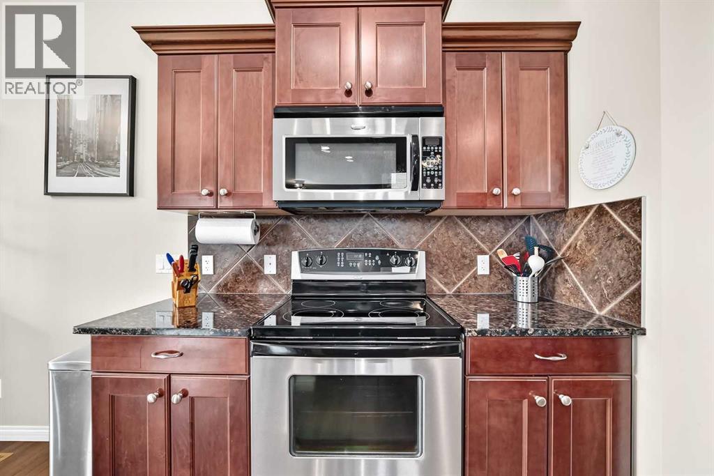 212 Aspenmere Close, Chestermere, Alberta  T1X 0G3 - Photo 9 - A2335519