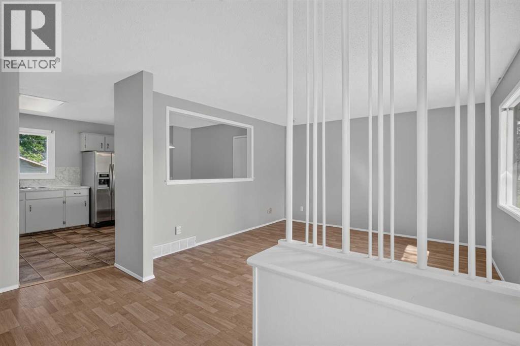 7935 Huntwick Hill Ne, Calgary, Alberta  T2K 4G9 - Photo 7 - A2335209
