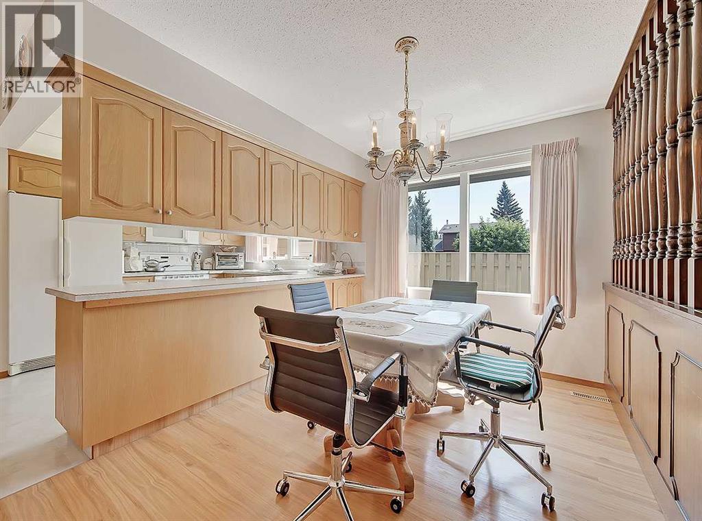9556 Oakland Way SW, Calgary, Alberta  T2V 4G5 - Photo 7 - A2337009