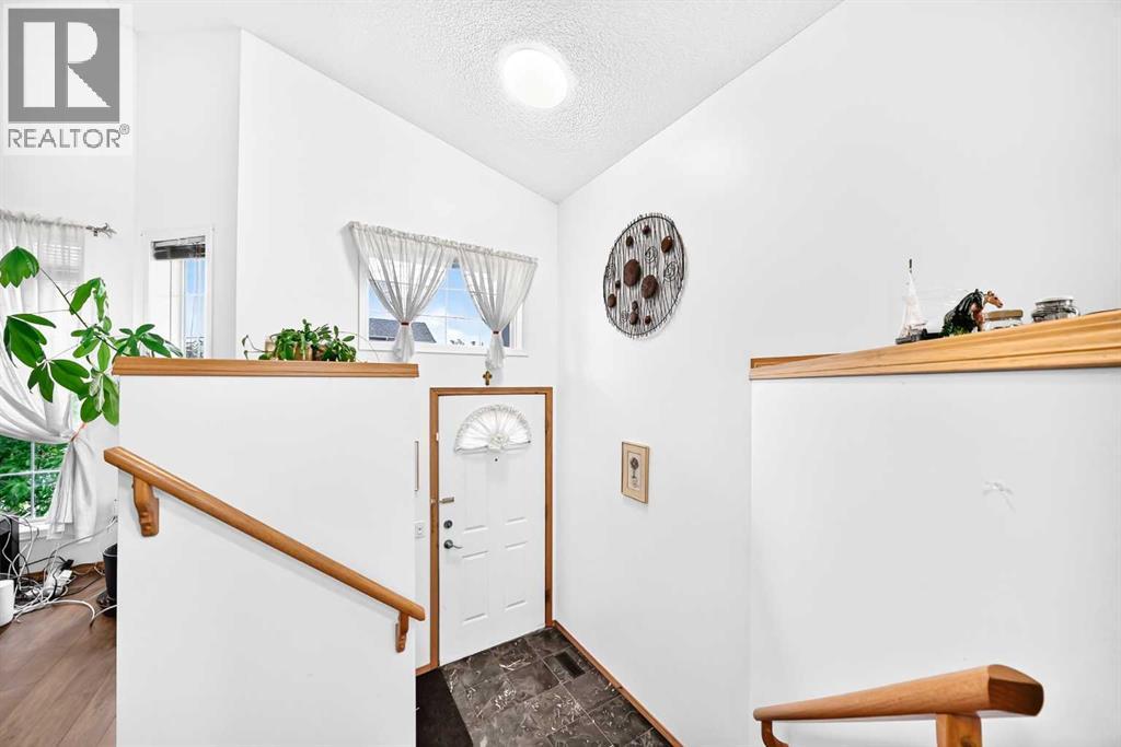 98 Country Hills Heights Nw, Calgary, Alberta  T3K 4Y6 - Photo 4 - A2321079