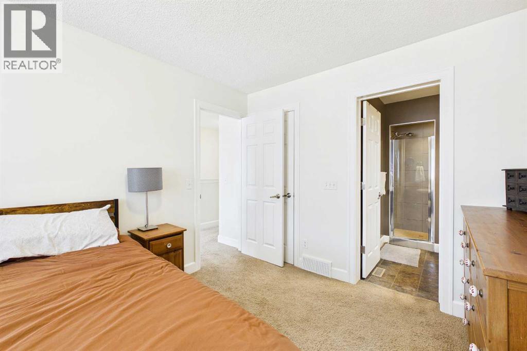 936 Windsong Drive SW, Airdrie, Alberta  T4B 0P3 - Photo 23 - A2335973