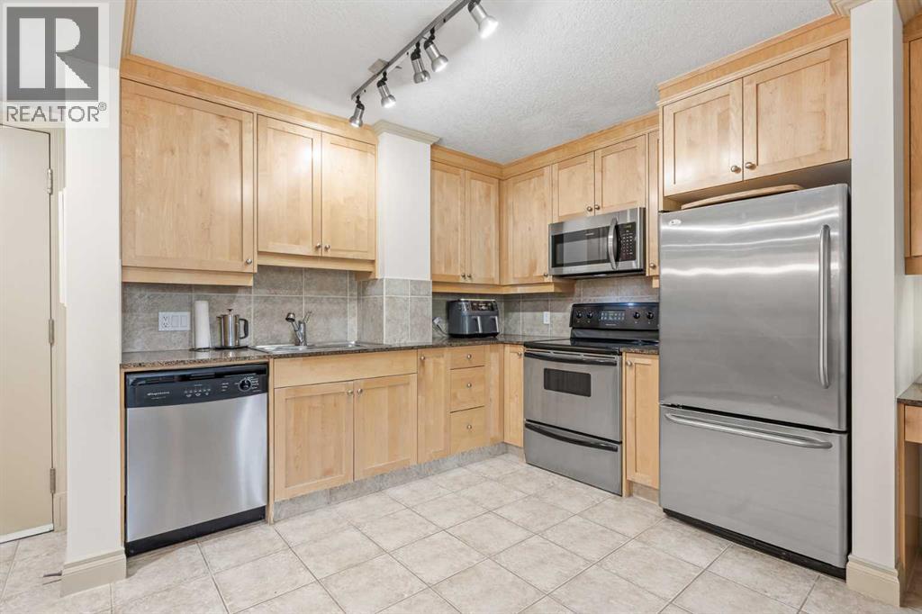 104, 4554 Valiant Drive Nw, Calgary, Alberta T3A 2V5 - Photo 5 - A2325576
