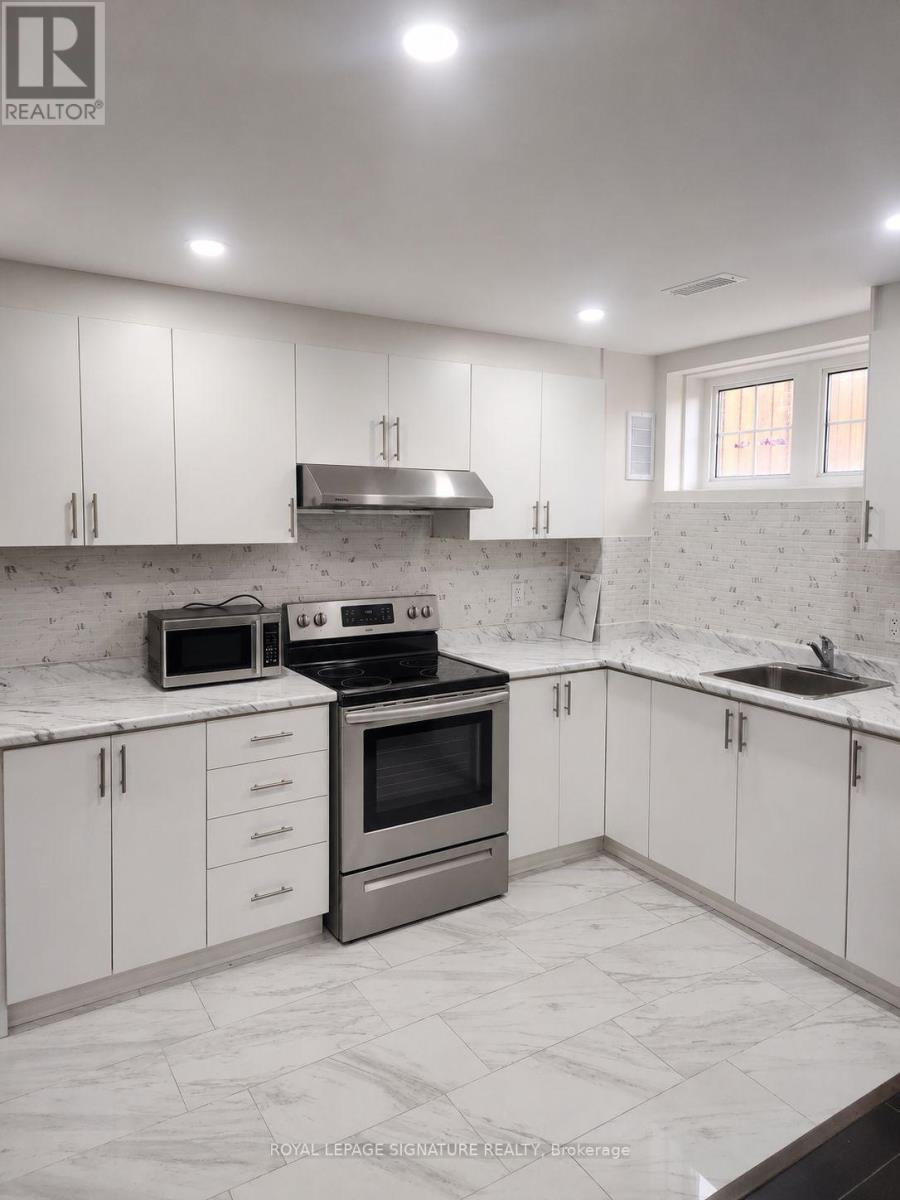 Basement - 404 Nairn Circle, Milton, Ontario L9T 8A5 - Photo 2 - W13676480
