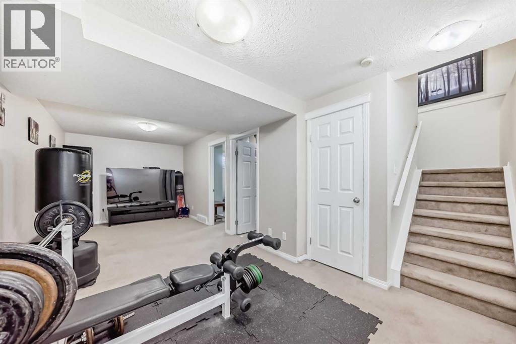 65 Spring Meadows Bay, Okotoks, Alberta  T1S 2G8 - Photo 33 - A2312954