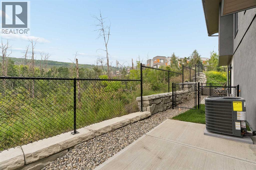 84, 1453 Na'a Drive SW, Calgary, Alberta  T3H 6H7 - Photo 33 - A2335395