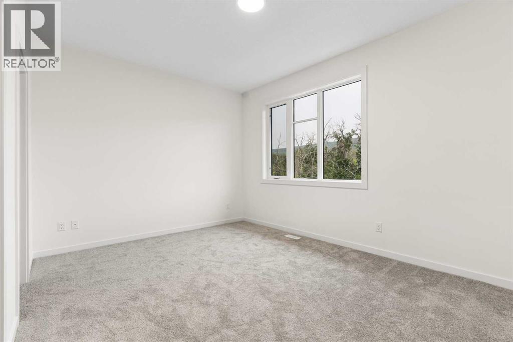 84, 1453 Na'a Drive SW, Calgary, Alberta  T3H 6H7 - Photo 23 - A2335395