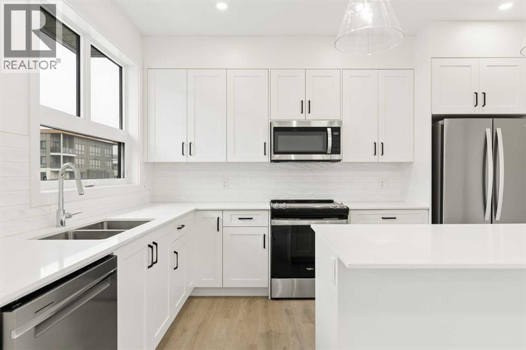 1475 Na'a Drive SW, Calgary, Alberta  T3H 6A4 - Photo 3 - A2335410