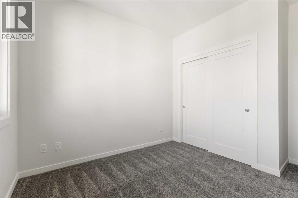 414, 1453 Na'a Drive SW, Calgary, Alberta  T3H 6H7 - Photo 24 - A2325527