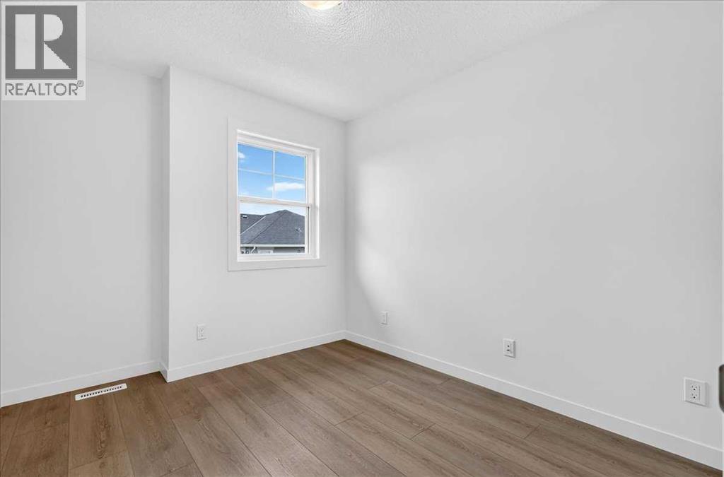134 New Brighton Landing Se, Calgary, Alberta T2Z 1C1 - Photo 34 - A2335865
