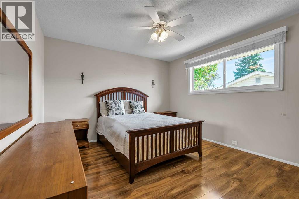 99 Huntford Road Ne, Calgary, Alberta  T2K 3Z1 - Photo 14 - A2317231