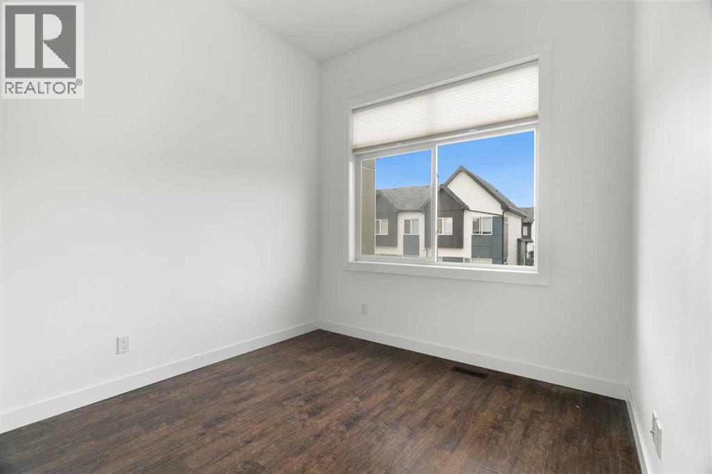 205, 1530 Bayside Avenue SW, Airdrie, Alberta  T4B 4B5 - Photo 20 - A2326723