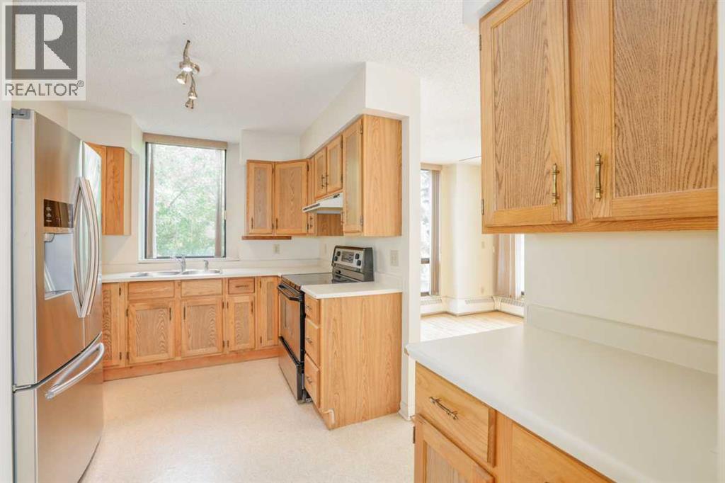 208, 80 Point Mckay Crescent Nw, Calgary, Alberta T3B 4W4 - Photo 11 - A2325460