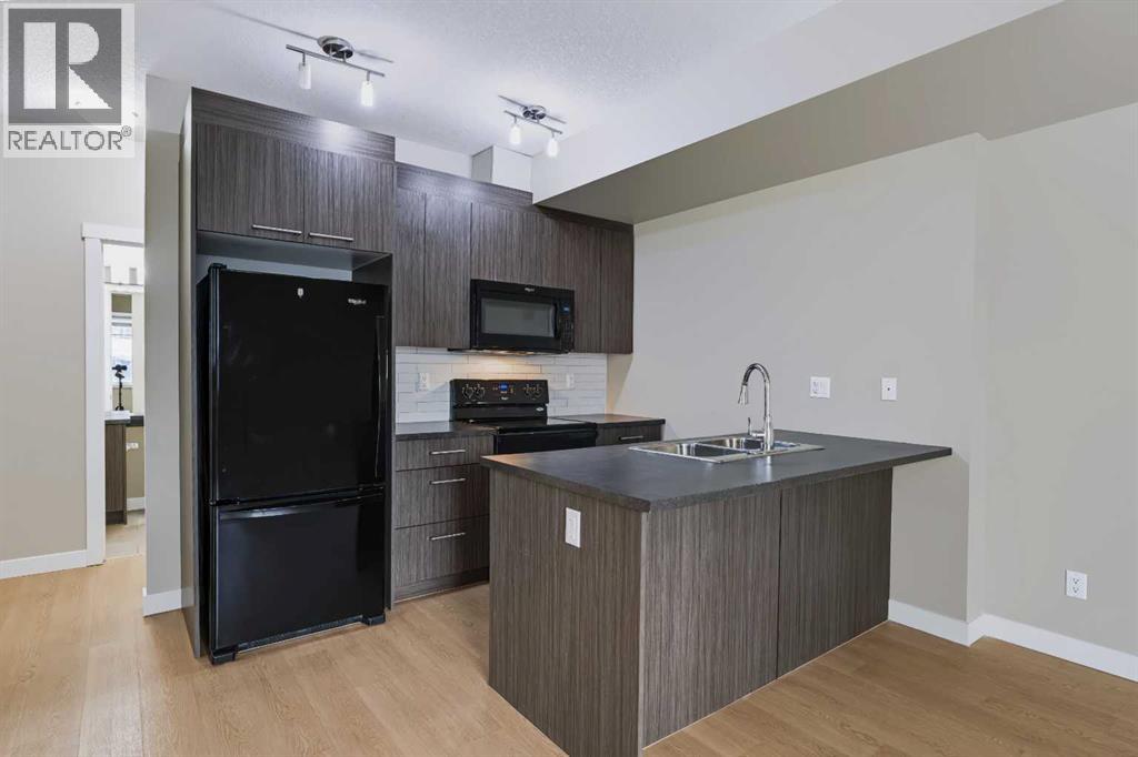 210, 300 Marina Drive, Chestermere, Alberta  T1X 0P6 - Photo 11 - A2336711
