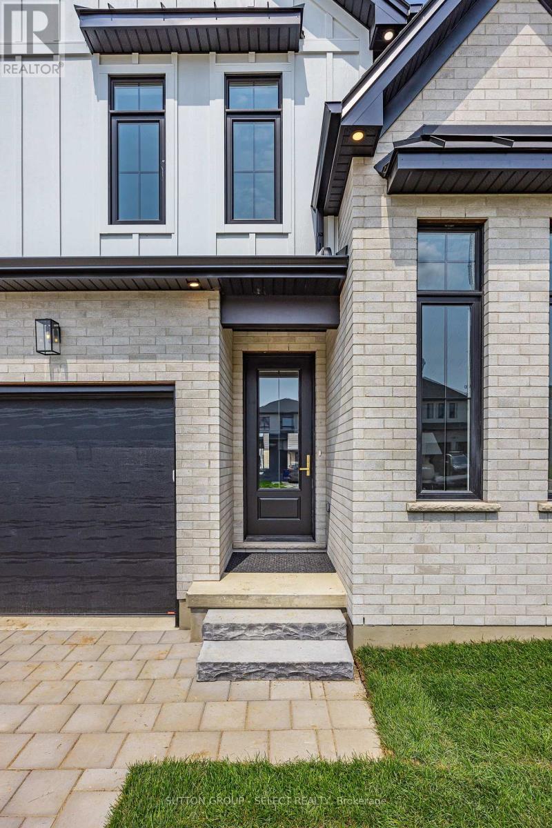 1906 Fountain Grass Drive, London South, Ontario  N6K 0K7 - Photo 3 - X13649426